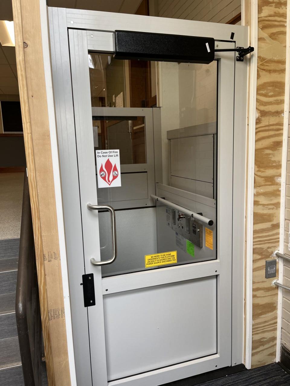 A new wheelchair lift located inside the ADA accessible entrance at the Washington School Apartments, as seen, Tuesday, May 14 in Sheboygan, Wis.