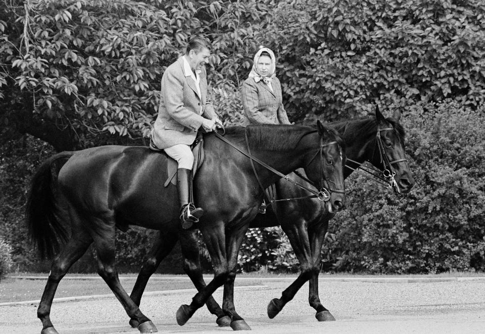 President Ronald Reagan and Queen Elizabeth II horseback riding in 1982 (Bob Daugherty / AP)