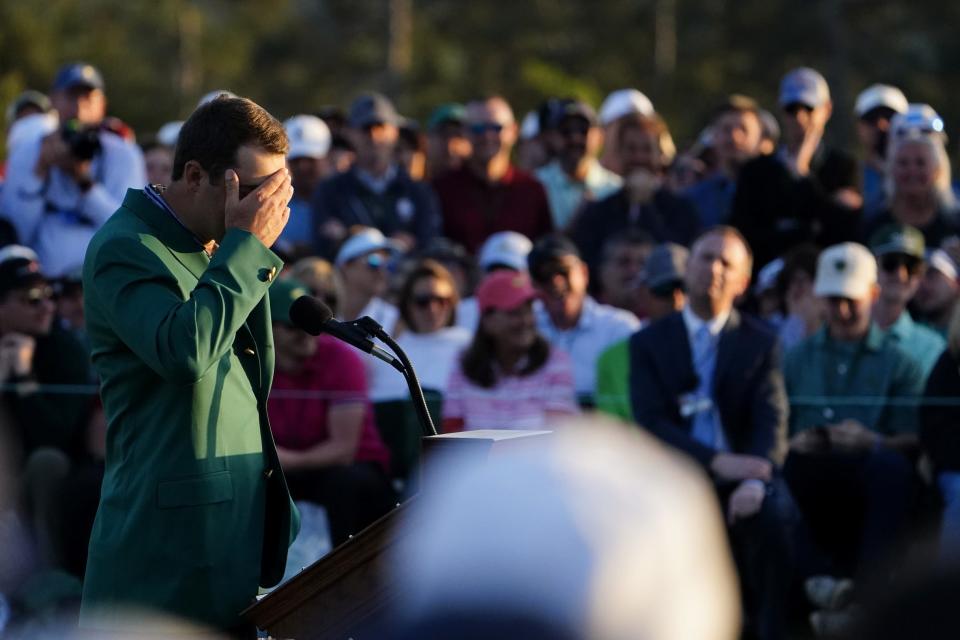 Scottie Scheffler gets emotional during his victory speech after the 2022 Masters Tournament.