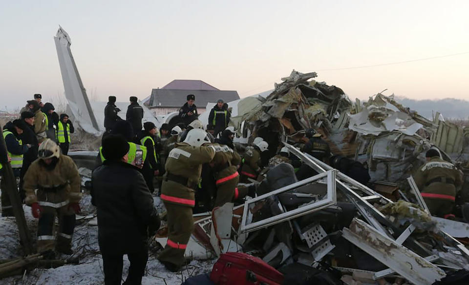 ALMATY, KAZAKHSTAN - DECEMBER 27, 2019: The site of a crash of a Bek Air plane carrying 95 passengers and 5 crew members near Almaty Airport. A Bek Air Fokker 100 passenger plane flying from Almaty to Nur-Sultan has crashed minutes after takeoff, broken through a concrete guardrail and clashed into a two-storey building. The accident has killed at least 14 people, dozens have been injured. The Press Office of the Committee for Emergency Situations of the Kazakhstan Interior Ministry/TASS (Photo by TASS\TASS via Getty Images)