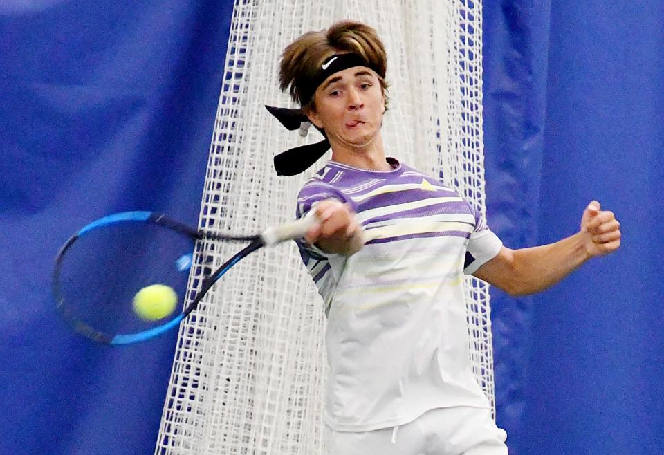Watertown's Evan Meester hits a return shot during a second-flight doubles match in the state 2023 Class AA high school boys tennis tournament. The two-day event concluded on Friday, May 19 at Sioux Falls.