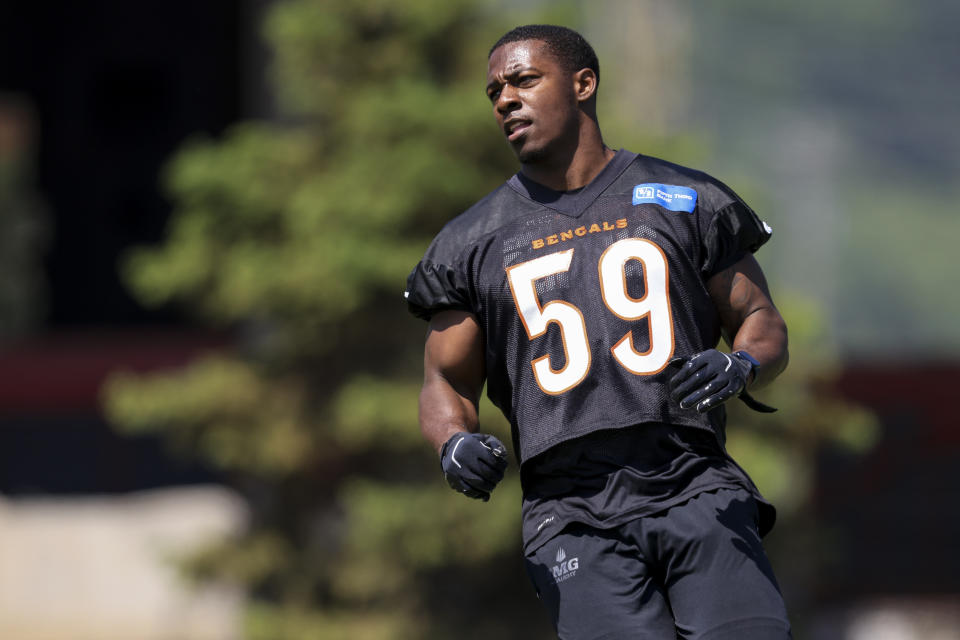 Cincinnati Bengals’ Akeem Davis-Gaither participates in a drill during an NFL football practice in Cincinnati, Tuesday, May 24, 2022. (AP Photo/Aaron Doster)