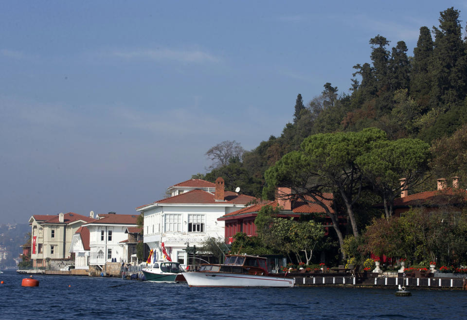 FILE - This Oct. 28, 2013 file photo shows waterside mansions called "yali," in Istanbul, Turkey. Istanbul is best-known among tourists for mosques and bazaars but the city offers many other interesting things for visitors to see, including the classic wooden-framed yali mansions along the waterfront. (AP Photo, File)