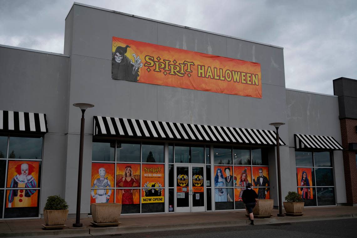 A customer walks in to the Spirit Halloween store in Bellingham, Wash.