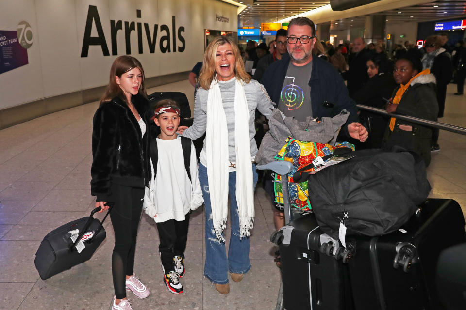 Kate Garraway, alongside her husband Derek Draper and two children Darcey, 13, and Bill, 10, arrives back at Heathrow Airport after the 2019 series of I'm A Celebrity ... Get Me Out Of Here!