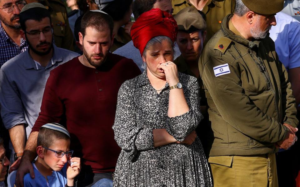 Mourners attend the funeral of Hillel and Yigal Yaniv, brothers from the Har Bracha settlement, killed by a suspected Palestinian gunman - Ronen Zvulun/Reuters