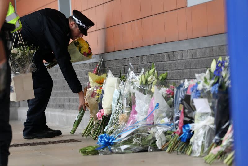 British police officer shot dead at custody centre in south London