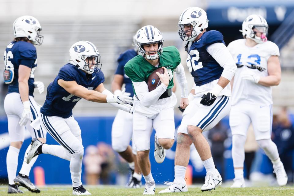 BYU quarterback Kedon Slovis runs the ball during the annual BYU Blue and White scrimmage at LaVell Edwards Stadium.