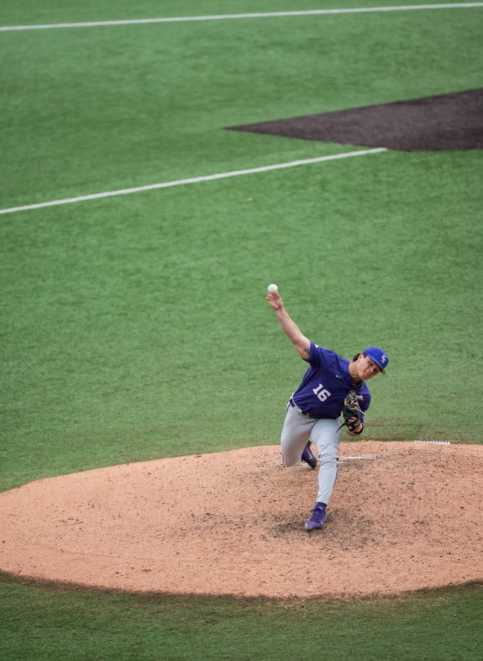 Kansas State's Tyson Neighbors, shown pitching against Texas on April 8, held the Longhorns to one hit in four innings Thursday to wrap up a 6-0 victory.