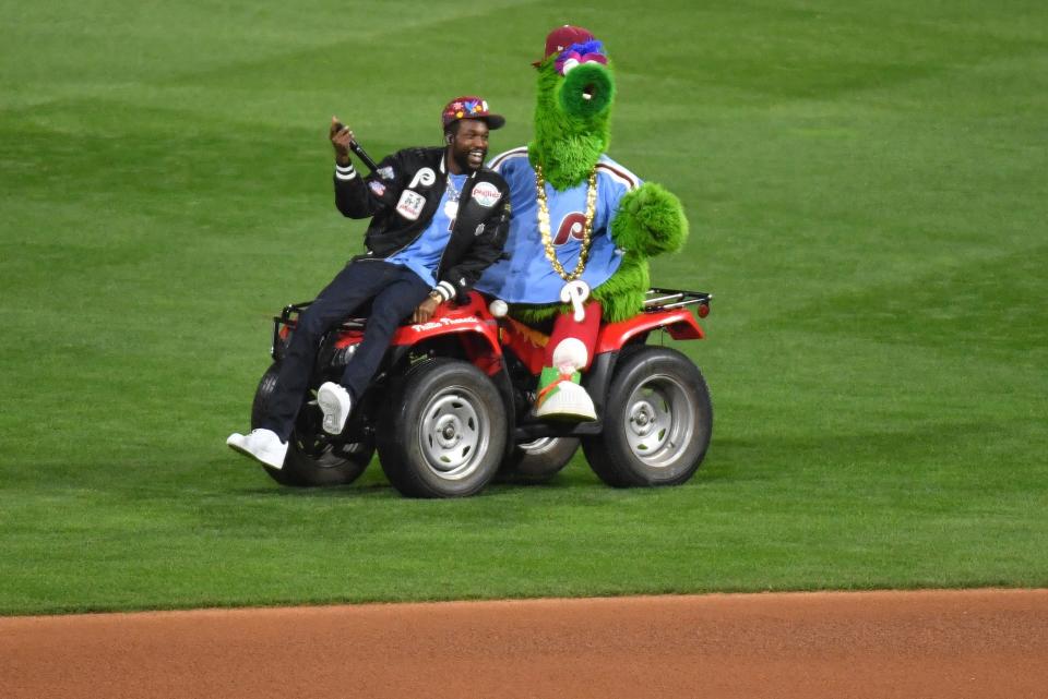 Game 5: Rapper Meek Mill and the Phillie Phanatic perform before the game.