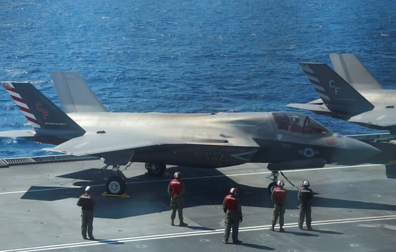 F-35B Lightning II aircrafts are seen on the deck of the HMS Queen Elizabeth aircraft carrier offshore Portugal