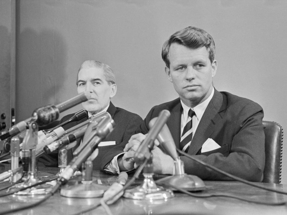 Robert Kennedy is shown during a press conference beside then-U.S. Attorney James O'Brien