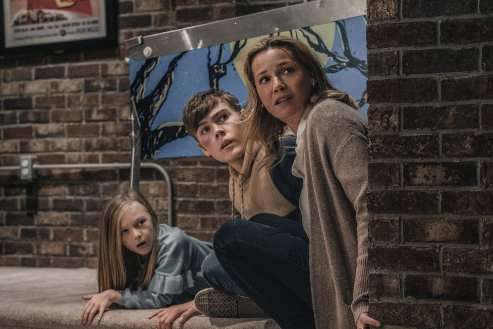 (from left) Sammy Mansell (Paisley Cadorath), Brady Mansell (Gage Munroe) and Becca Mansell (Connie Nielsen) in Nobody, directed by Ilya Naishuller. (Universal Pictures)