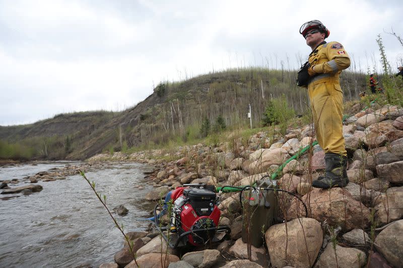 Wildfire causes evacuation from communities on the southern edge of Fort McMurray