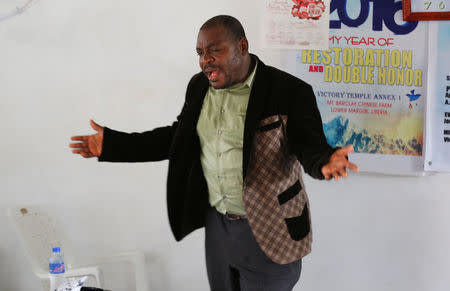 Evangelist and ex-combatant Joshua Milton Blahyi preaches in a church in his hometown of Grand Gedeh, Liberia, July 3, 2016. REUTERS/Thierry Gouegnon