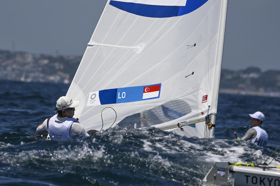 Singapore sailor Ryan Lo competes in the men's laser event at the 2020 Tokyo Olympics. (PHOTO: Olivier Morin/AFP)