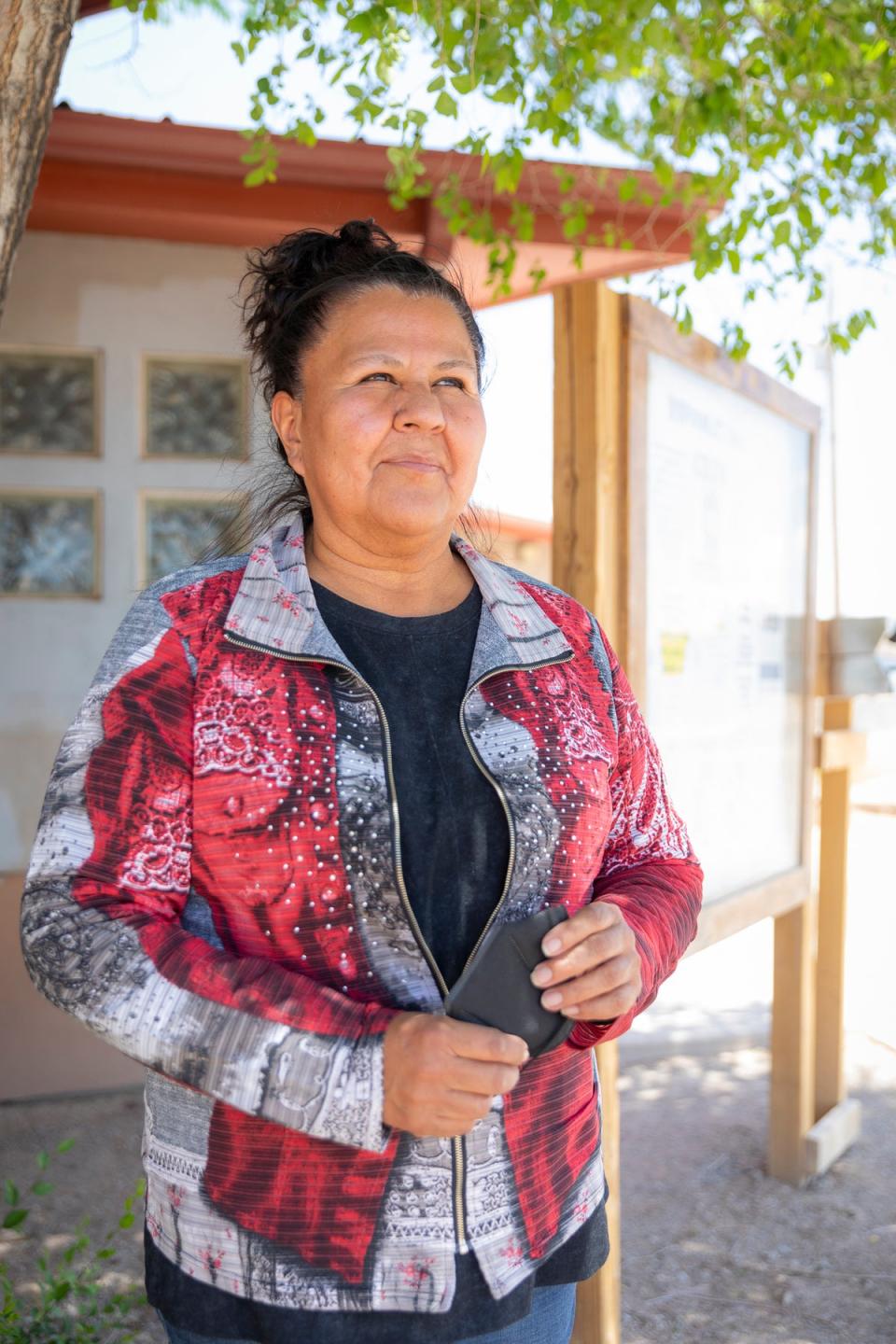 Cindy Howe, manager of the Navajo Water Project, outside the Baca/Prewitt Chapter house in Prewitt, New Mexico (Gabriella Marks for The Independent)
