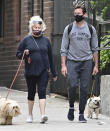 <p>Hugh Jackman and wife Deborra-Lee Furness take their dogs for an early-morning stroll in New York City on Thursday.</p>