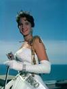 <p>Lynda Mead from Mississippi smiles for the camera in her white strapless gown—a design that, for the time, was rather risqué.</p>