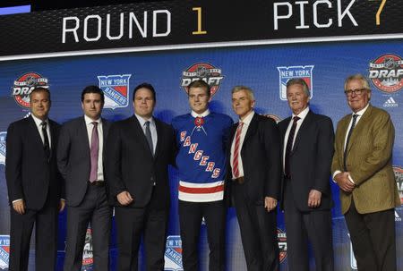 June 23, 2017; Chicago, IL, USA; Lias Andersson poses for photos after being selected as the number seven overall pick to the New York Rangers in the first round of the 2017 NHL Draft at the United Center. Mandatory Credit: David Banks-USA TODAY Sports