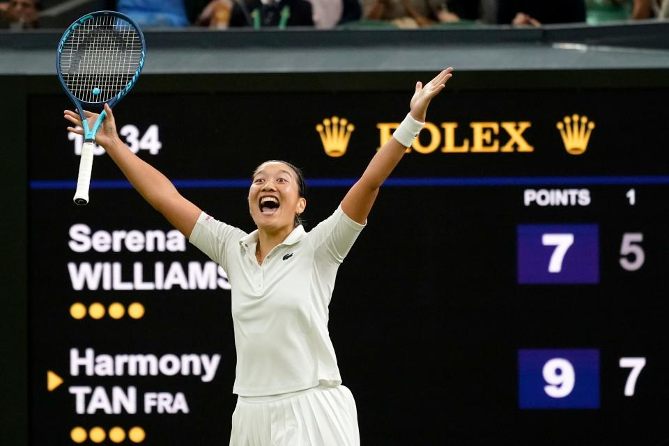 France's Harmony Tan celebrates after beating Serena Williams in a first-round match at Wimbledon.