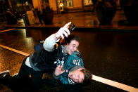 <p>Philadelphia Eagles football fans celebrate their Super Bowl LII victory over the New England Patriots in downtown Philadelphia, Pennsylvania, U.S. February 4, 2018. REUTERS/Jessica Kourkounis </p>