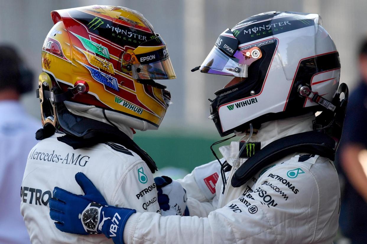 Hamilton celebrates with second-placed Valtteri Bottas: AFP/Getty Images