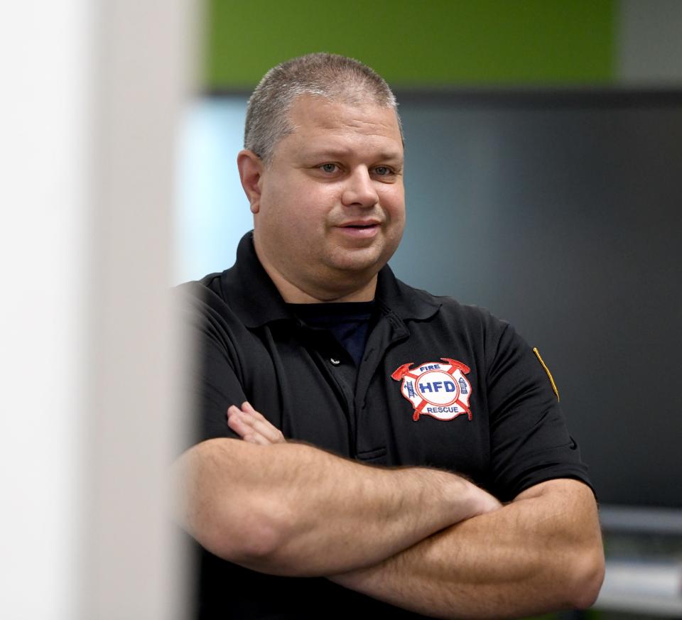 Hartville Fire Chief Mike Lorentz stands by as the Lake Local School District conducts a sudden cardiac arrest drill Thursday at Lake Middle/High School. The Lake Local School District is seeking to become the first Stark County school district to have each of its schools designated as a heart safe school through Project ADAM.