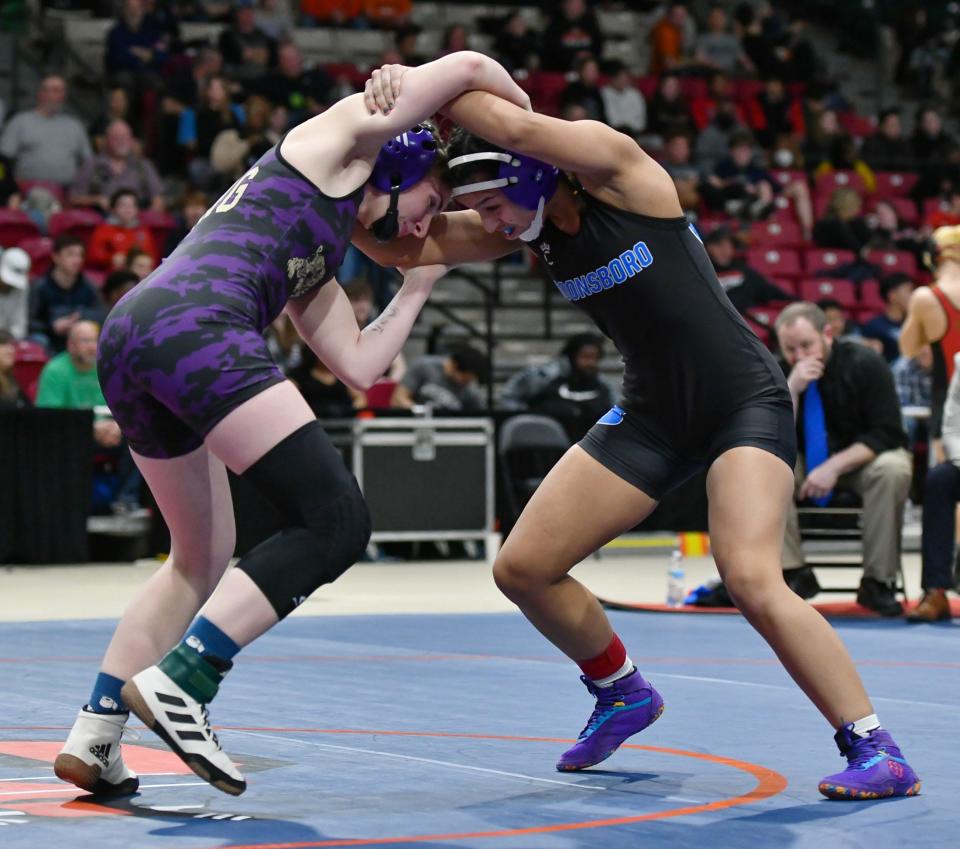 Smithsburg's Allie Grossnickle, left, and Boonsboro's Amelia Mikus meet in the girls championship final at 135 pounds.