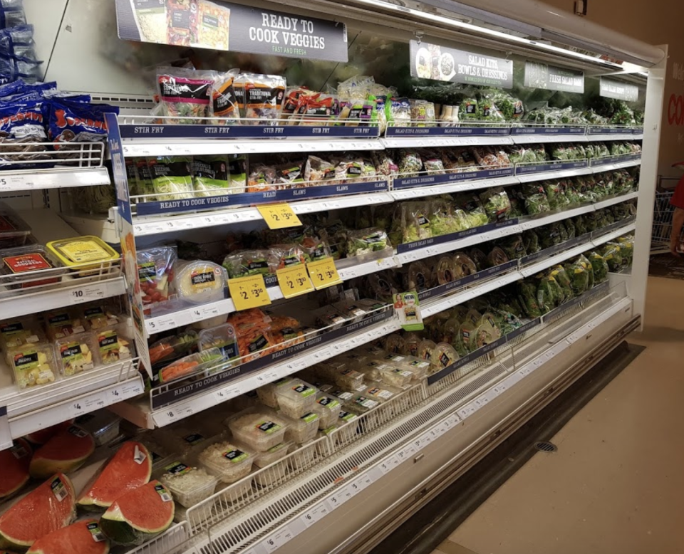 Coles fridge displaying pre-packed salads inside the Ayr store in Queensland.