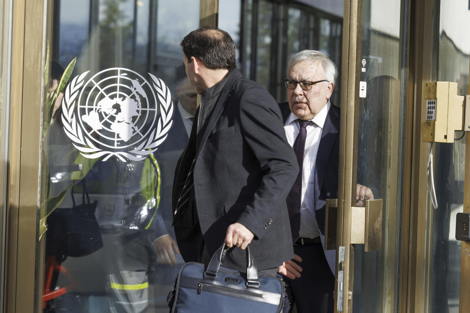 Russia's Deputy Foreign Minister Sergei Vershinin, right, leaves the U.N. building after a meeting with the U.N. officials for talks on Black Sea Grain Initiative, at the European headquarters of the United Nations in Geneva, Switzerland, Monday, March 13, 2023. Senior U.N. officials hosted Russian envoys in Geneva on Monday in a bid to extend an export agreement amid Moscow's invasion of Ukraine and prevent a potential new spike in world food prices. (Salvatore Di Nolfi/Keystone via AP)