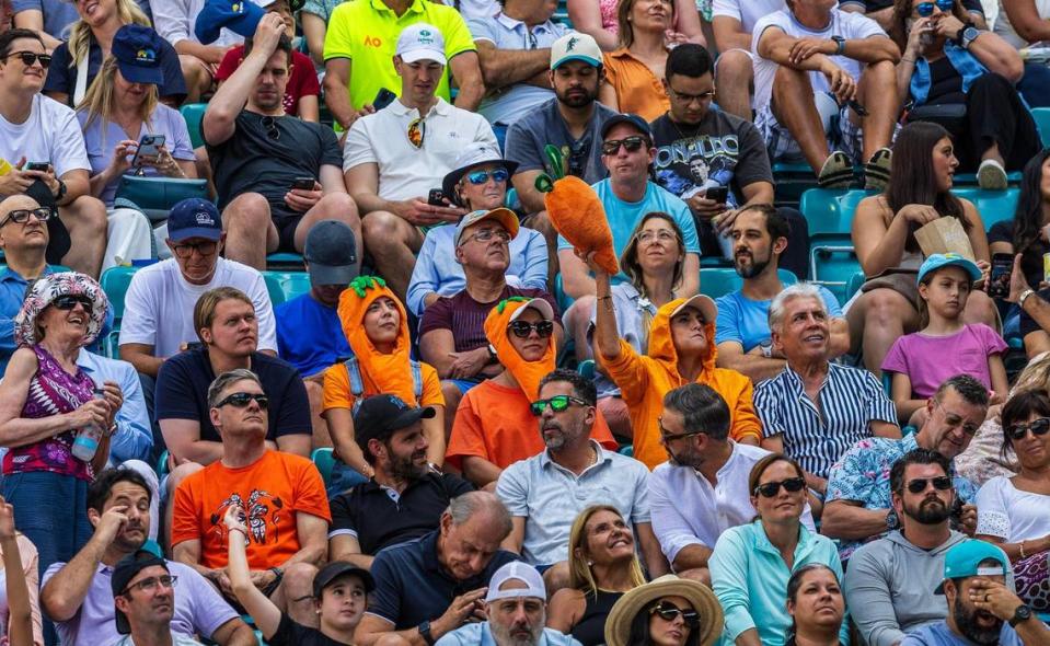 Fans of Jannik Sinner, of Italy dress as carrots as during his match against Daniil Medvedev, of Russia, in the men’s single men’s semifinals at the Miami Open tennis tournament, on Friday, March 29, 2024. Pedro Portal/pportal@miamiherald.com