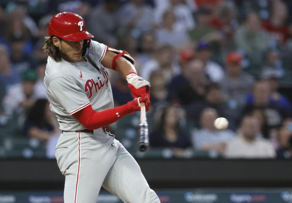 Philadelphia Phillies' Alec Bohm hits a double to drive in Bryce Harper during the eighth inning of a baseball game against the Detroit Tigers on Monday, June 24, 2024, in Detroit. (AP Photo/Duane Burleson)