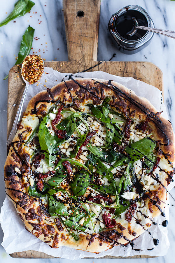 <strong>Get the <a href="http://www.halfbakedharvest.com/spring-time-mushroom-asparagus-white-burrata-cheese-pizza-balsamic-drizzle/" target="_blank">Mushroom, Asparagus and White Burrata Cheese Pizza with Balsamic Drizzle recipe</a> from Half Baked Harvest</strong>