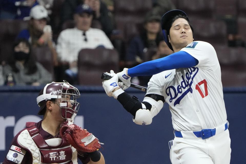 Los Angeles Dodgers' designated hitter Shohei Ohtani is stuck out during the second inning of the exhibition game between the Los Angeles Dodgers and Kiwoom Heroes at the Gocheok Sky Dome in Seoul, South Korea, Sunday, March 17, 2024. The Los Angeles Dodgers and the San Diego Padres will meet in a two-game series on March 20th-21st in Seoul for the MLB World Tour Seoul Series. (AP Photo/Ahn Young-Joon)