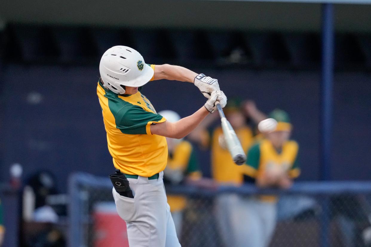 Benton Central's Tyler Klemme (4) hits the ball during the second inning of an IHSAA baseball game, Tuesday, April 12, 2022 at Gordon Leming Field in Lafayette.