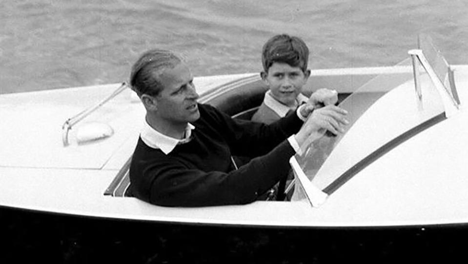 Prince Philip and a young Prince Charles in the Duke’s Albatross speedboat. - Credit: Bonhams