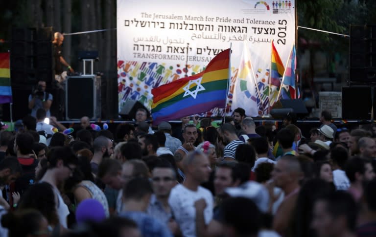 Participants of the Gay Pride parade gather in a park in Jerusalem after an ultra-orthodox Jew stabbed six people, in Jerusalem on July 30, 2015