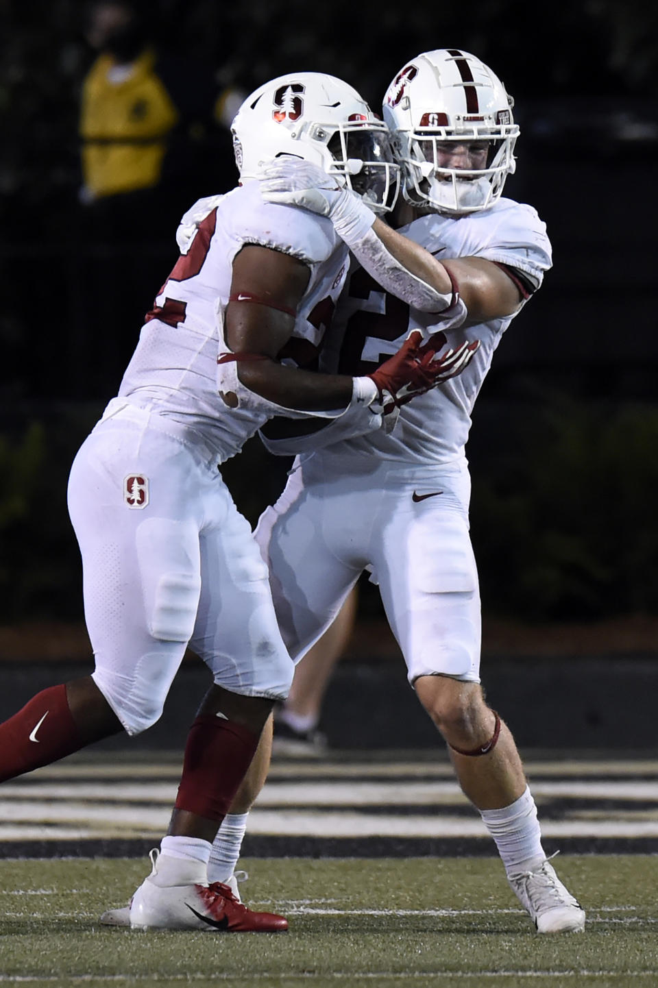 Stanford's Casey Filkins (2) celebrates with running back E.J. Smith (22) after Smith scored a touchdown against Vanderbilt during the second half of an NCAA college football game Saturday, Sept. 18, 2021, in Nashville, Tenn. (AP Photo/Mark Zaleski)