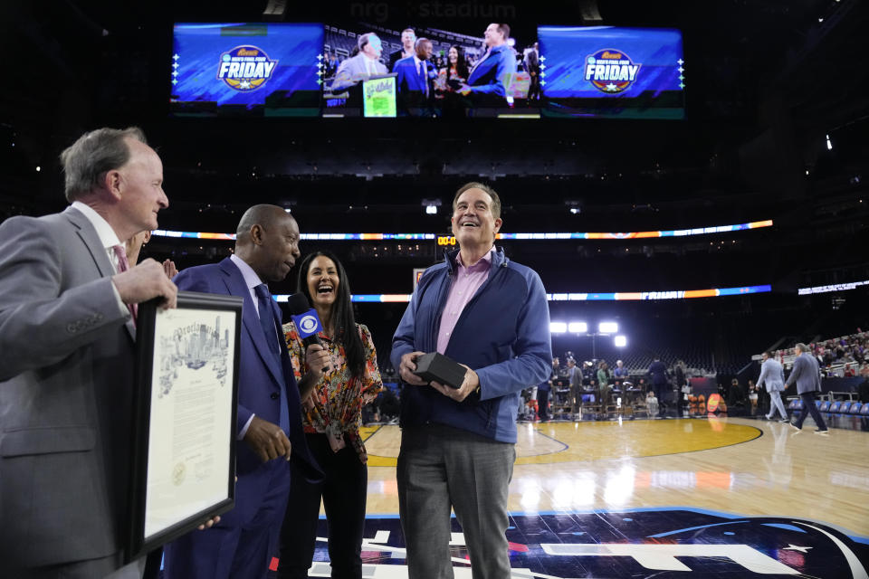 Broadcaster Jim Nantz is honored during practices for the Final Four college basketball games in the NCAA Tournament on Friday, March 31, 2023, in Houston. Nantz's near four-decade career covering March Madness ends after Monday's final between UConn and San Diego State. (AP Photo/David J. Phillip)