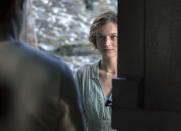 This image released by Netflix shows Emma Corrin in a scene from "Lady Chatterley's Lover." (Parisa Taghizadeh/Netflix via AP)