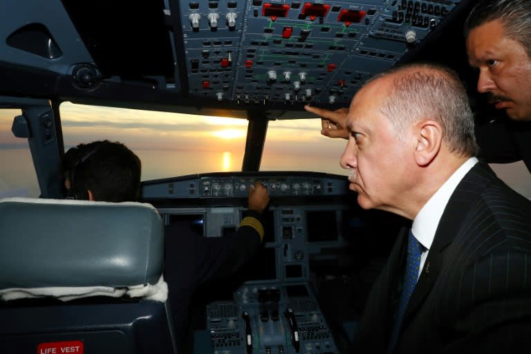 President Recep Tayyip Erdogan flies towards Istanbul's new airport, seeking to showcase it as evidence of his track record in building mega-projects