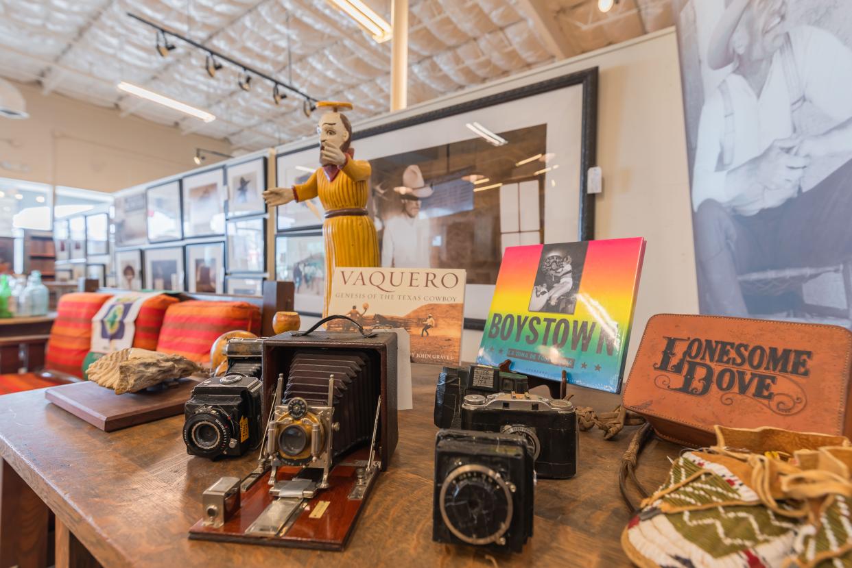 Perhaps the most familiar items on auction from the Bill Wittliff estate at Vogt Galleries in San Antonio are Wittliff's fine art photographs taken during the shooting of "Lonesome Dove," shown hanging on the back wall.