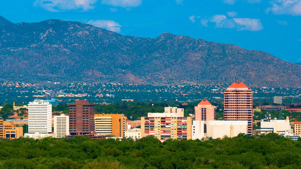 Albuquerque downtown skyline with the Sandia Mountains in the background.