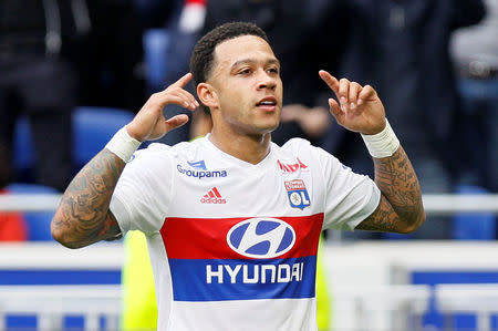 Soccer Football - Ligue 1 - Olympique Lyonnais v FC Nantes - Groupama Stadium, Lyon, France - April 28, 2018 Lyon's Memphis Depay celebrates scoring their first goal REUTERS/Emmanuel Foudrot