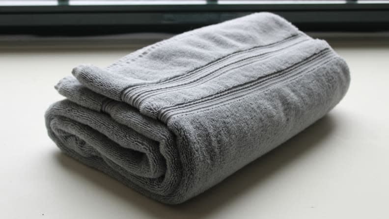 Using a towel can help seal in cracks, thus containing hot air in specific rooms, which can help keep your home cooler.