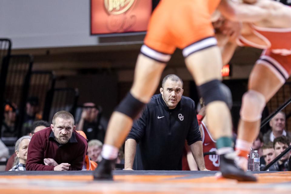 Oklahoma head coach Lou Rosselli watches during a college wrestling meet between the Oklahoma State Cowboys (OSU) and the Oklahoma Sooners at Gallagher-Iba Arena in Stillwater, Okla., Thursday, Feb. 16, 2023.