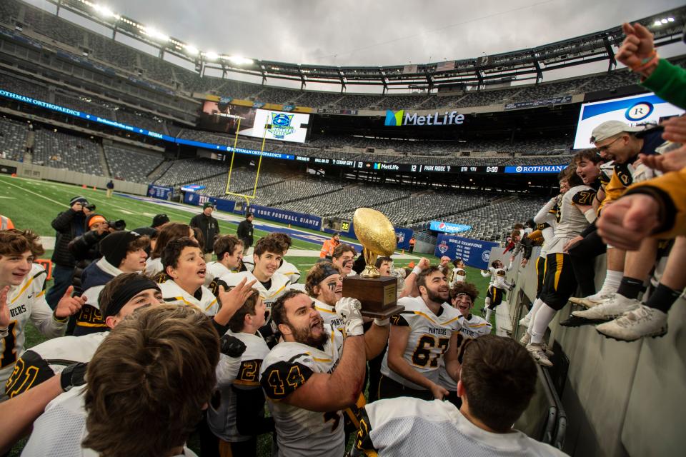 Cedar Grove celebrates defeating Park Ridge in the North Group 1 regional championship gameÊat MetLife Stadium on Friday, November 26, 2021. 