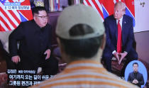 <p>A man watches the news at the Seoul Railway Station on Tuesday. (Photo: Ahn Young-joon/AP) </p>