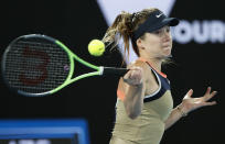 Ukraine's Elina Svitolina makes a forehand return to United States' Coco Gauff during their second round match at the Australian Open tennis championship in Melbourne, Australia, Thursday, Feb. 11, 2021.(AP Photo/Rick Rycroft)